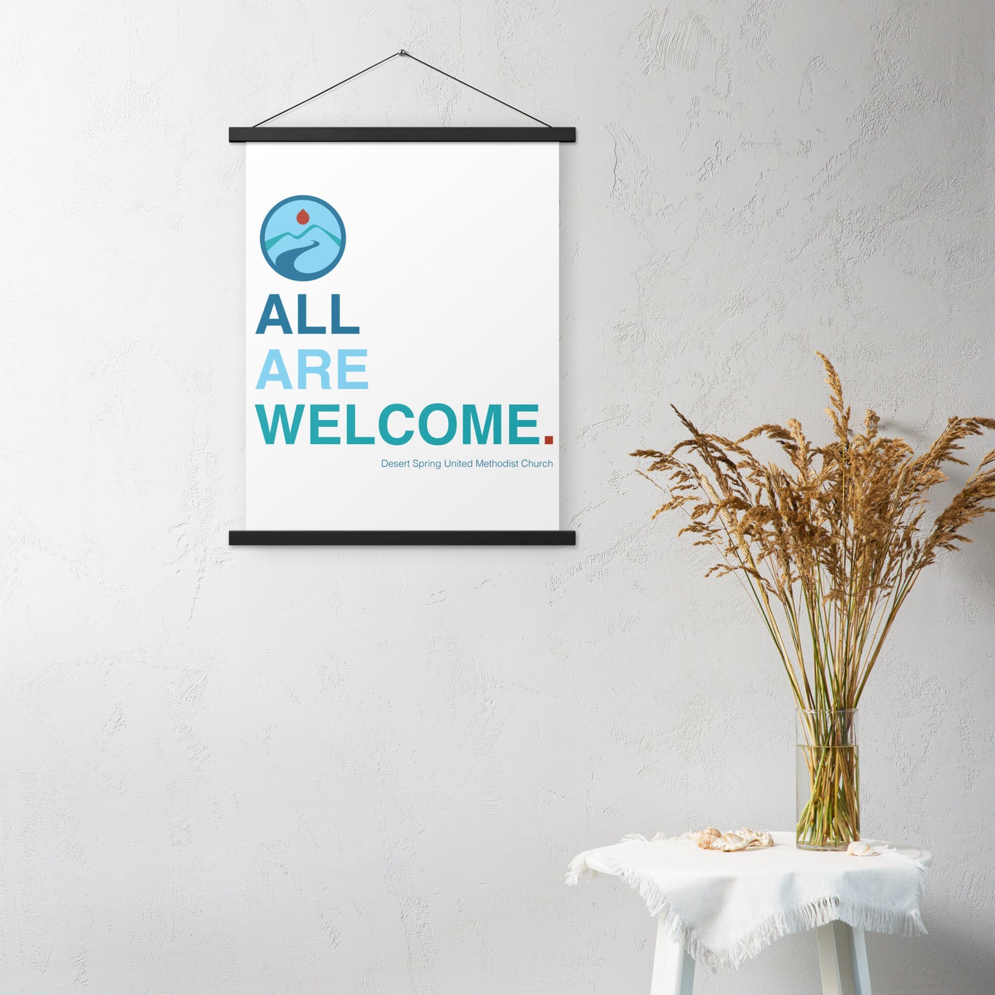 All Are Welcome Poster with hangers