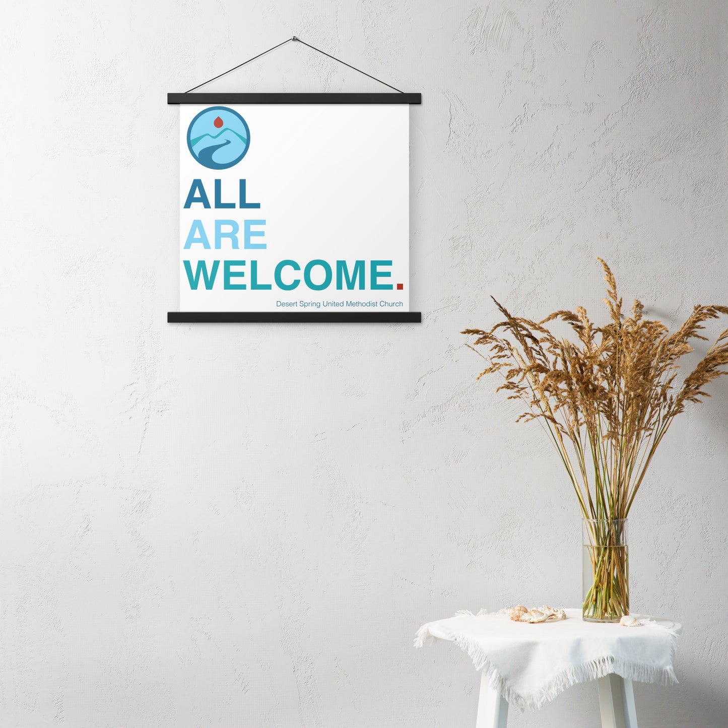 All Are Welcome Poster with hangers